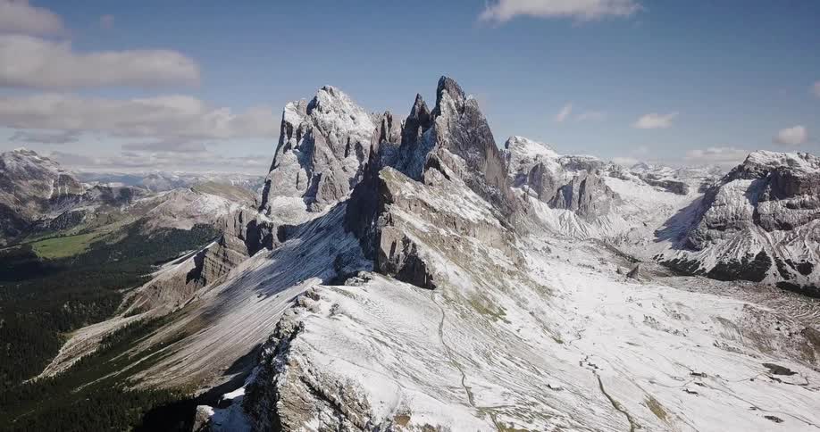 The mountains are covered with ice and frost