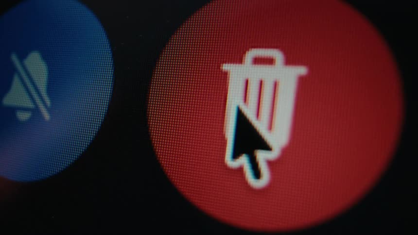 A macro view of a computer screen shows a user's cursor hovering over and clicking a red trash can icon to delete a message
