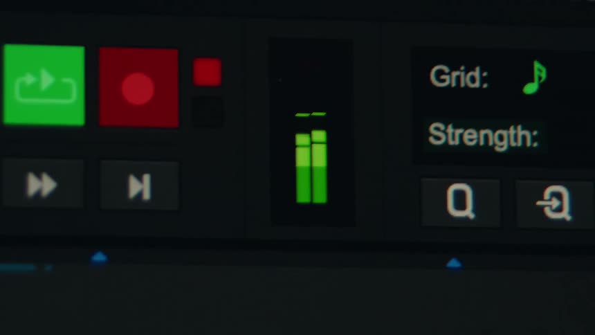 An extreme close-up of a digital audio workstation's interface shows the green sound level meter fluctuating during a recording