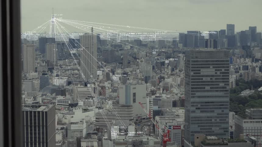 A sprawling metropolitan city is overlaid with a futuristic digital network of data and information