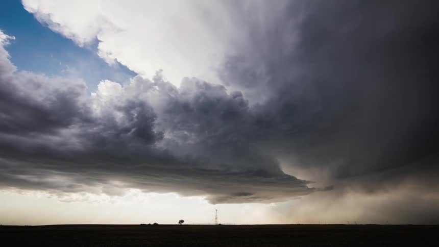 Time lapse of clouds rolling over plains