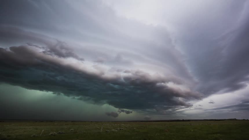 Clouds and lightning rolling over plains