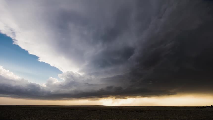 Time-lapse of clouds moving over flat lands