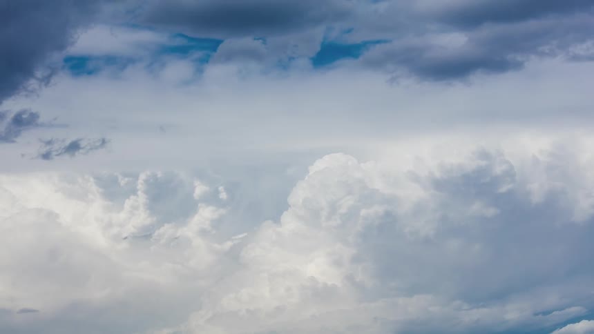 View of white clouds rolling through the sky
