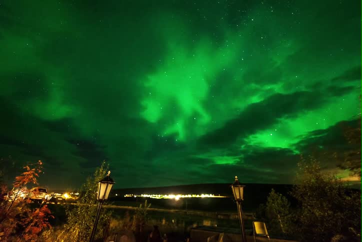 The aurora borealis lights up the sky