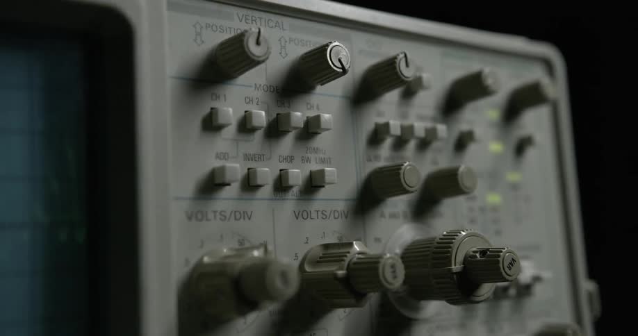The knobs and dials of a piece of monitoring equipment