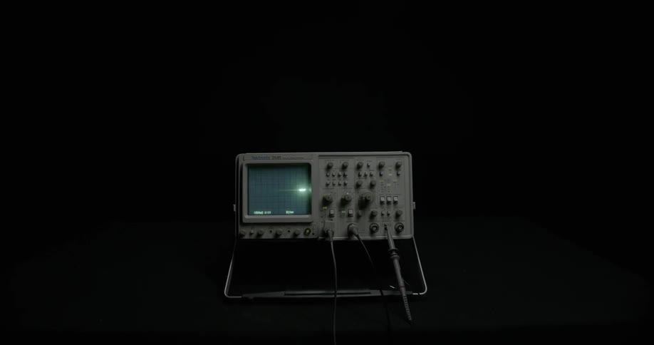 Lights blip across the screen of measuring equipment