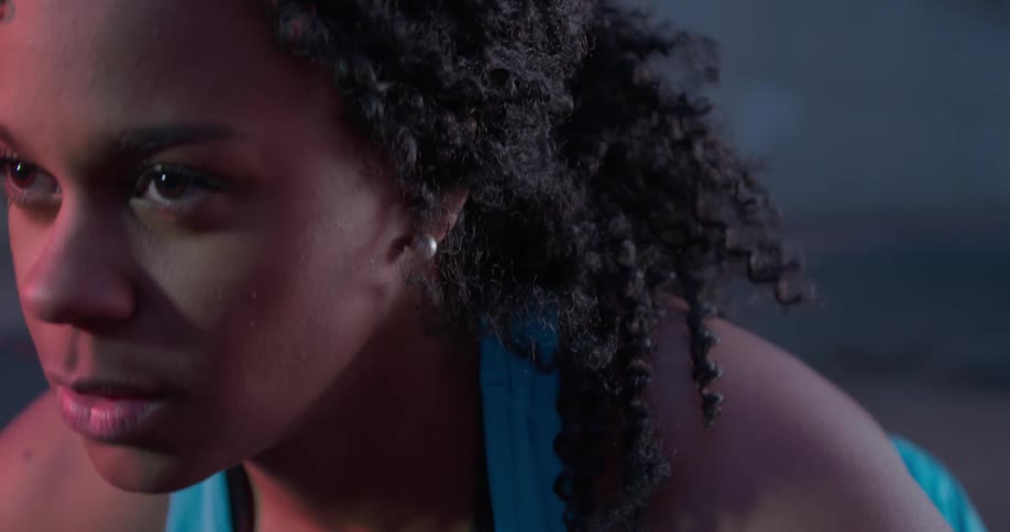 Woman looks up like she is ready to run