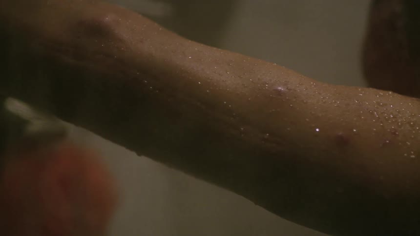 Close up of sweat beads on an arm