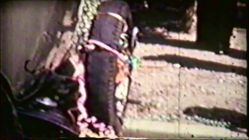 Vintage 8mm footage from the 1940s shows a newlywed couple's getaway car decorated by wedding guests