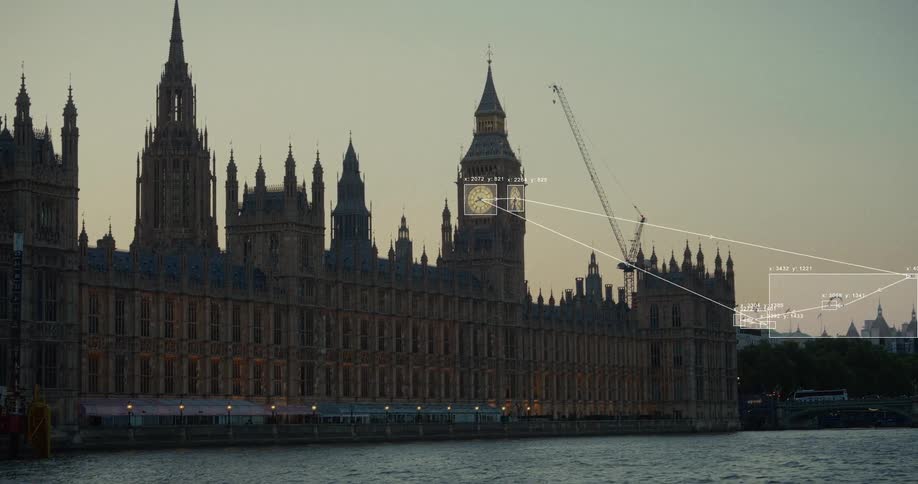 A high-tech digital overlay scans and analyzes data from London's iconic Houses of Parliament and Big Ben at dusk