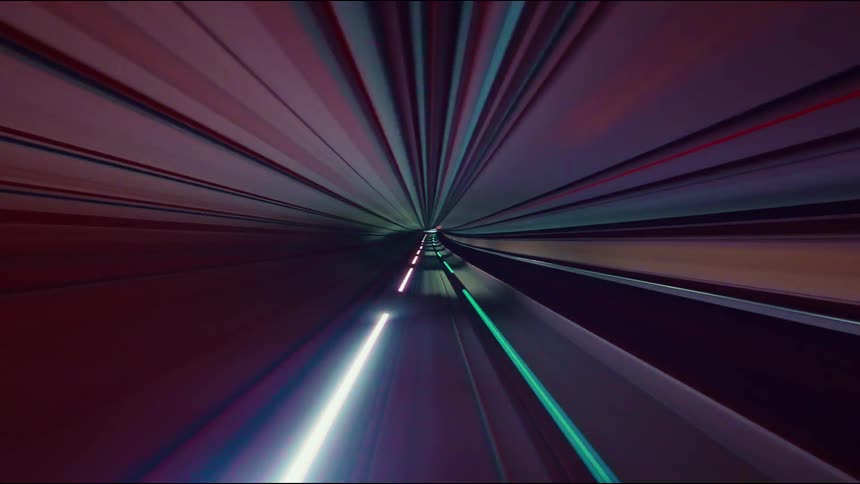 A vibrant and abstract POV time-lapse of a high-speed train journey through a futuristic, colorful tunnel