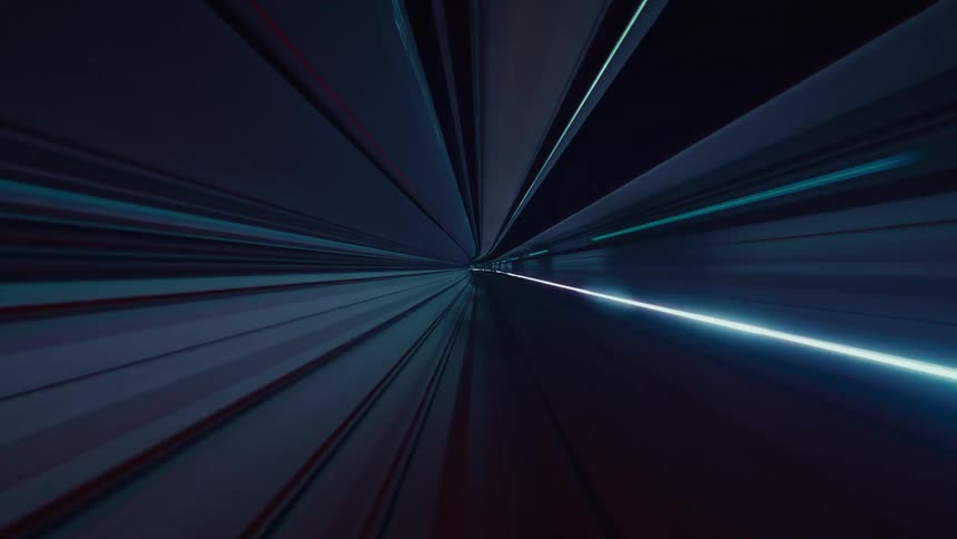 A futuristic high-speed journey through an abstract subway tunnel creates mesmerizing light trails and vibrant motion blur