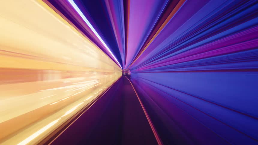 A fast-paced, psychedelic journey through a neon-lit subway tunnel with abstract, streaking light effects