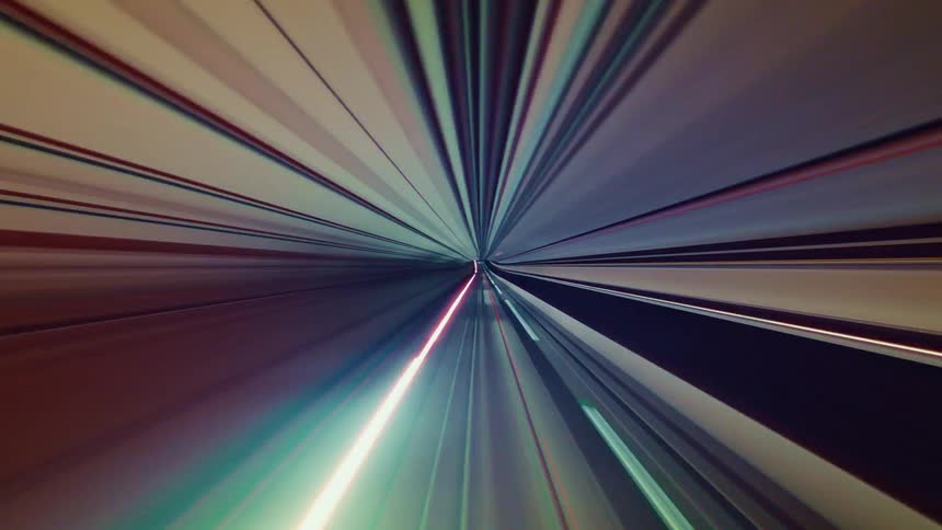 An abstract and futuristic time-lapse journey through a glowing, high-speed tunnel of colorful light