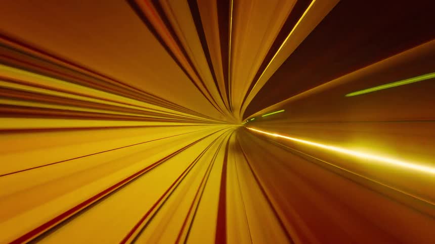 A futuristic point-of-view time-lapse of a high-speed journey through a subway tunnel with streaking, colorful lights