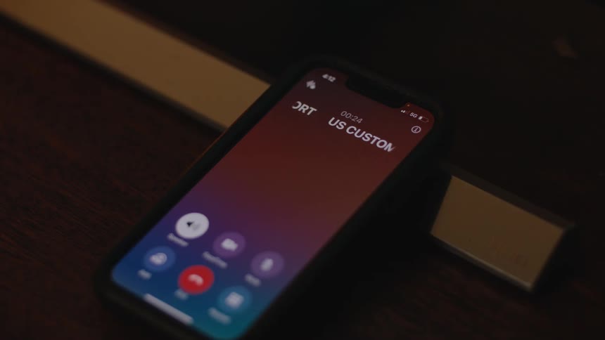 Glitched and misspelled text for 'Customer Support' flickers across a smartphone screen during an ongoing call