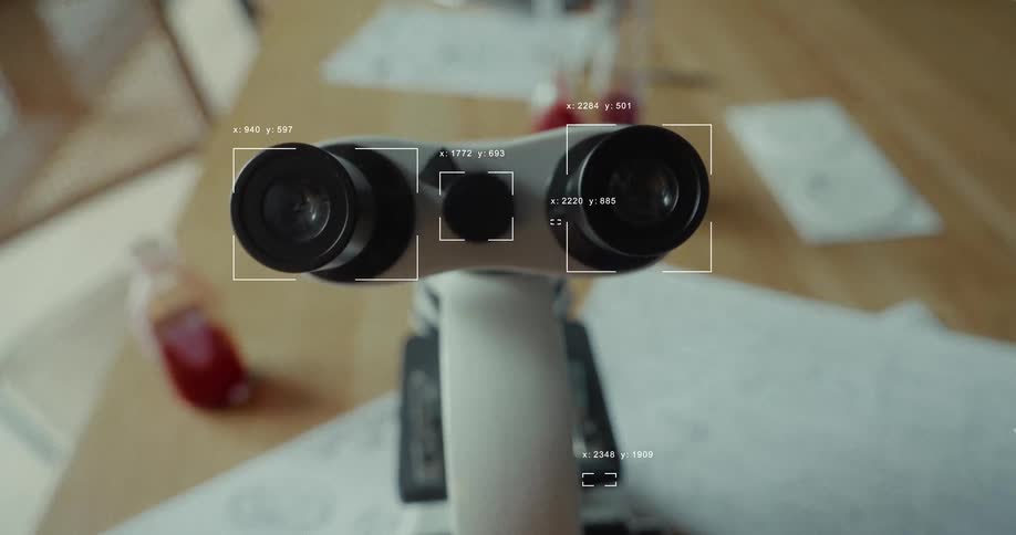 A first-person view with a futuristic heads-up display analyzing a microscope in a science lab