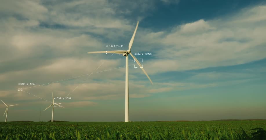 Futuristic data analysis of wind turbines spinning in a green field to generate renewable energy