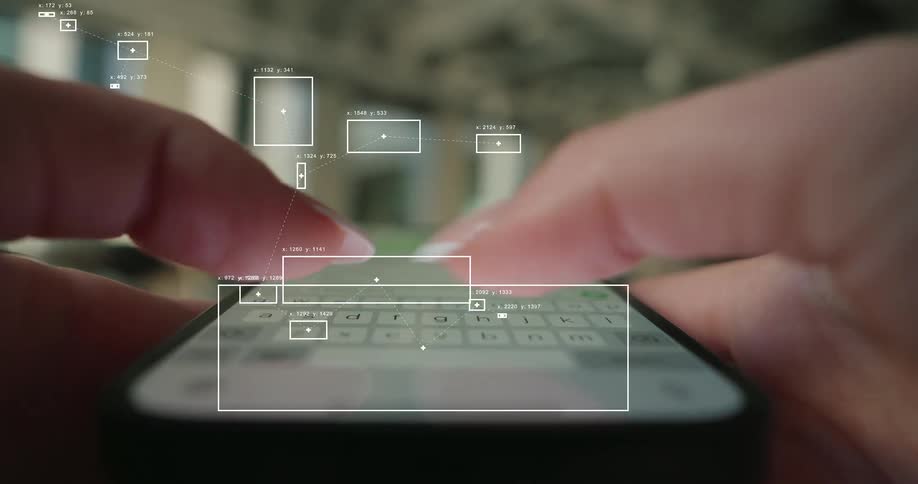Futuristic data tracking graphics are superimposed over a close-up of fingers typing on a smartphone
