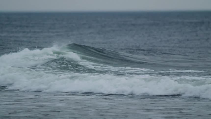 Waves roll on the sea