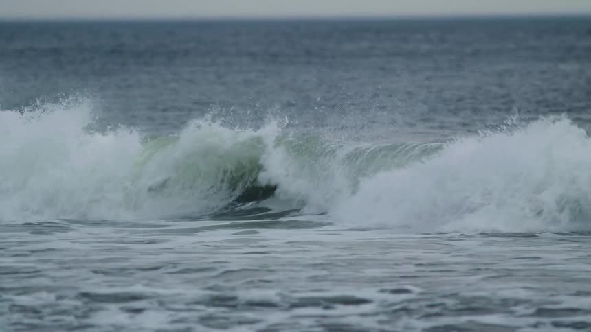 Waves roll on the ocean
