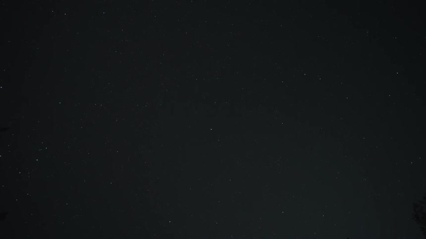 A time-lapse of the vast, star-filled night sky as constellations slowly drift across the frame