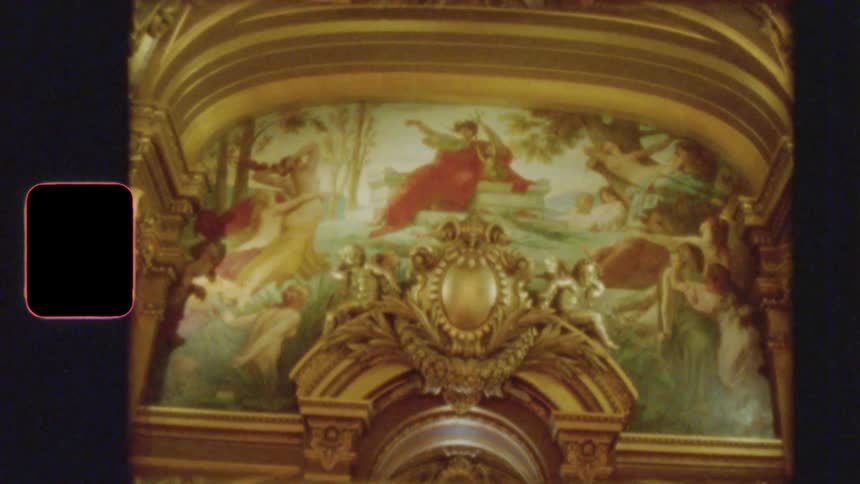 Super 8 film captures the intricate details of a classical mural and gilded architecture inside an opulent opera house