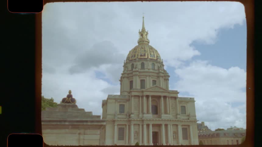 Authentic 16mm film footage of a moving shot revealing the grand architecture of Les Invalides in Paris