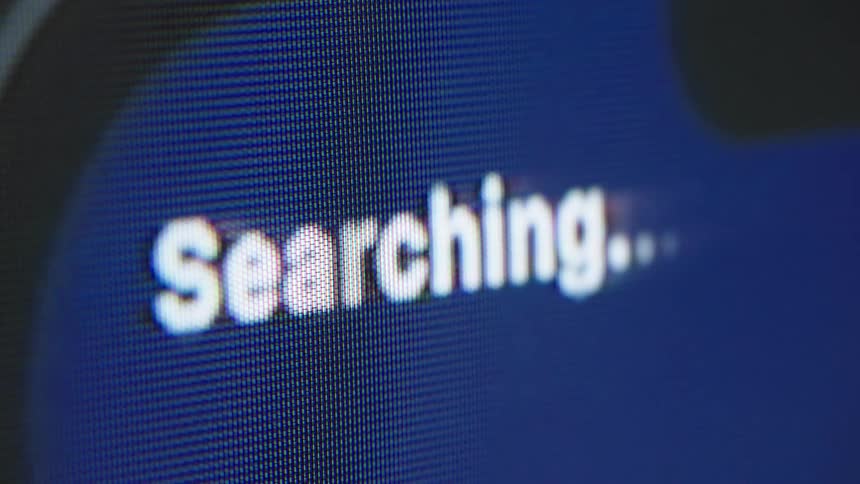 A macro shot of a digital screen shows a 'Searching...' message that ultimately fails and displays a red 'No Service' notification