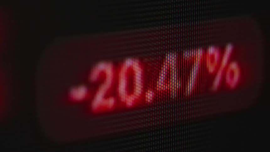 Extreme close-up of a digital stock ticker shows a financial asset rapidly losing value and ending in a crash