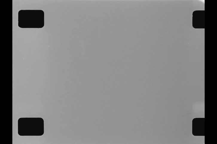 Old black and white 16mm double perforated film frame overlay with visible sprocket holes, dust, and scratches for a retro look