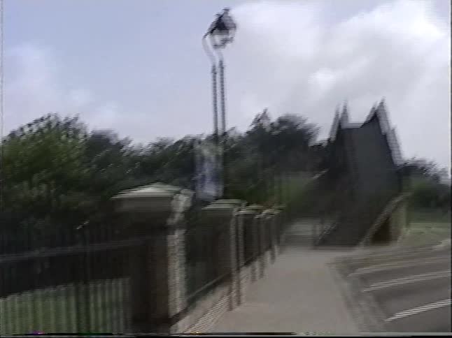 A 1990s home video captures scenes from a visit to Vicksburg, Mississippi, including the historical siege marker and a view of the river bridge