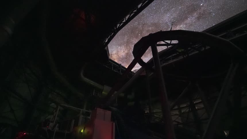 An incredible timelapse from within a giant observatory shows the complex machinery of the telescope moving as the starry night sky and Milky Way pass overhead