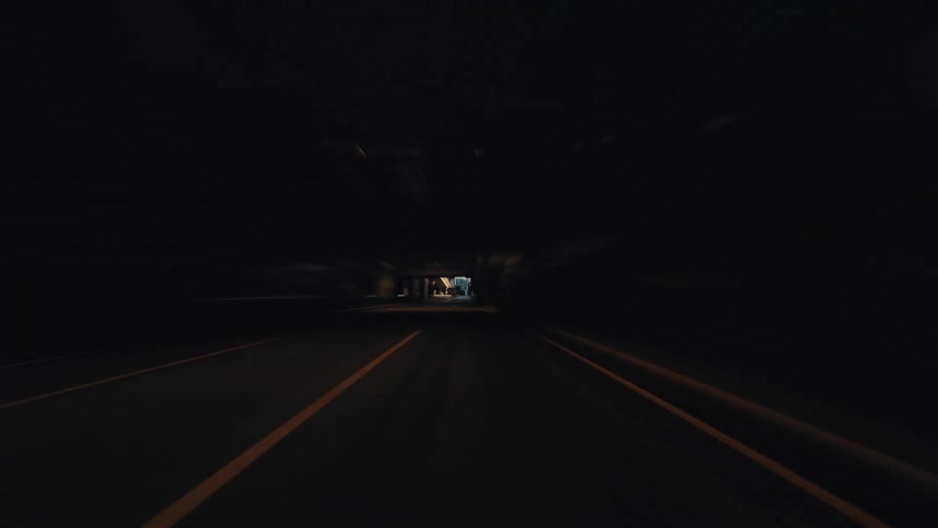 Experience a high-speed journey through a city's highways and underpasses at dusk in this stylized hyperlapse