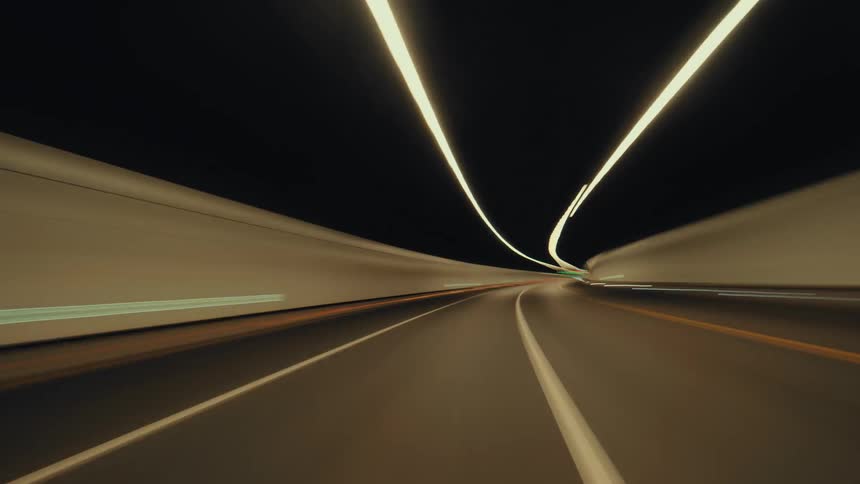 An exhilarating hyper-lapse POV drive on a city highway that transitions into a futuristic tunnel, creating abstract light trails at night