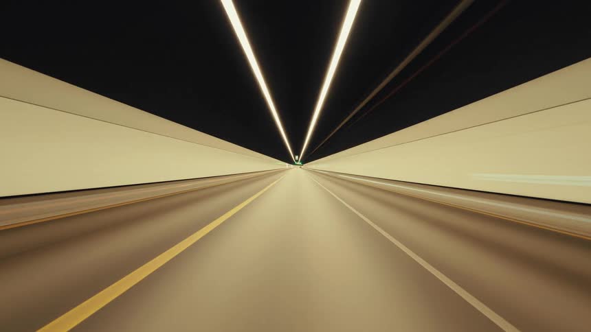 A seamless loop of a surreal first-person time-lapse captures a high-speed journey through a brightly lit, futuristic highway tunnel