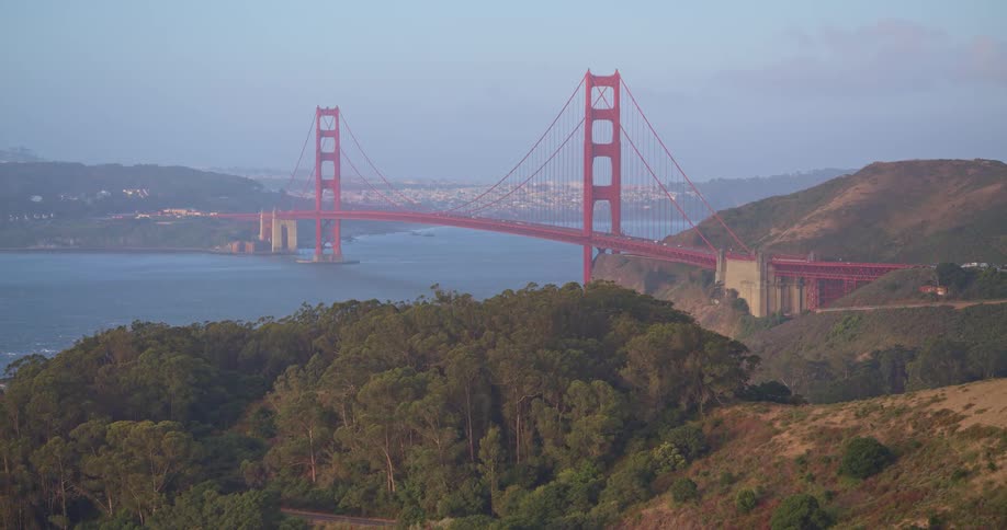 A scenic, wide shot of the Golden Gate Bridge in San Francisco as seen from the Marin Headlands
