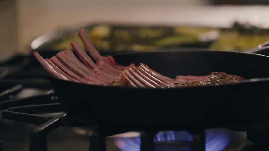 Ribs cooking in a frying pan