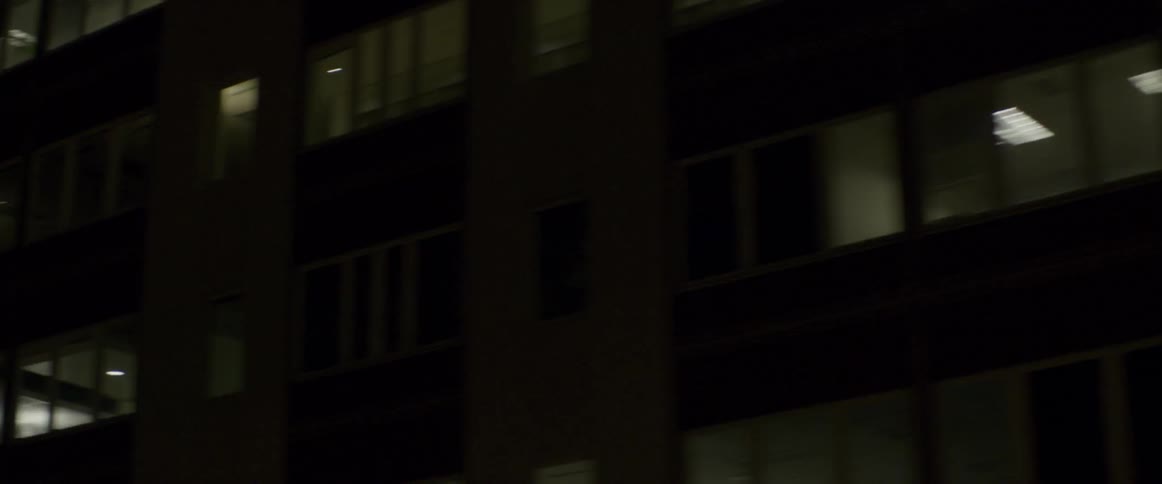The street is lined with buildings