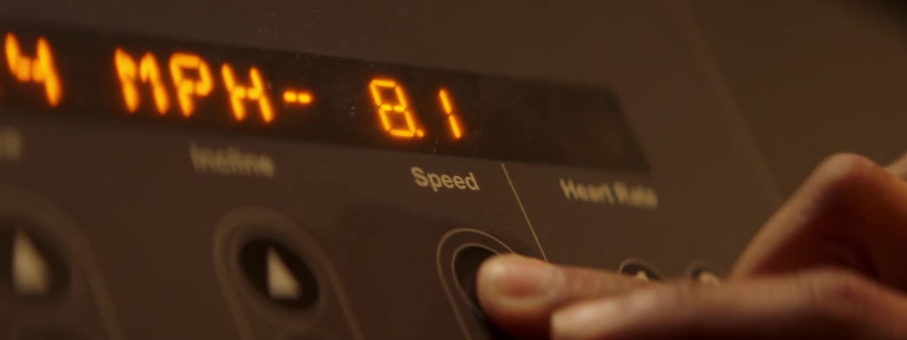 Finger pushes a button and numbers on a screen rise