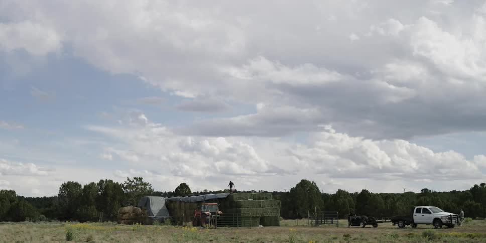 Person walking on a high horizon on a cloudy day