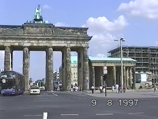Archival VHS footage from 1997 shows a slow pan and zoom on the iconic Brandenburg Gate in Berlin, Germany