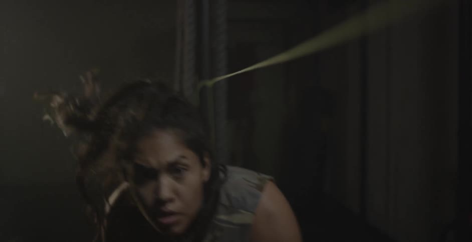 A woman trains in a gym
