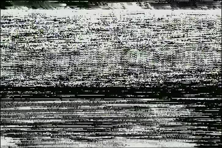 A black and white television screen displays analog static, noise, and signal interference