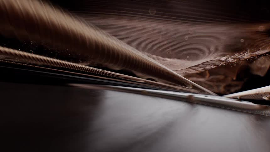 An elegant and sophisticated animation of fluid, metallic brown waves against a black background