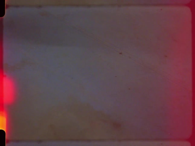 Vintage Super 8 film reveals a Gleason's Gym sign before being washed out by intense light leaks