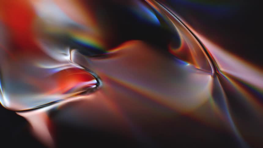 A mesmerizing flow of abstract molten glass reflects a rainbow of prismatic light against a dark background