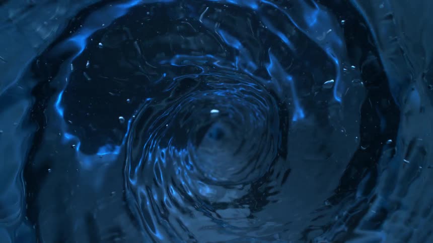 A mesmerizing top-down slow-motion view of a swirling blue water vortex creating a hypnotic tunnel