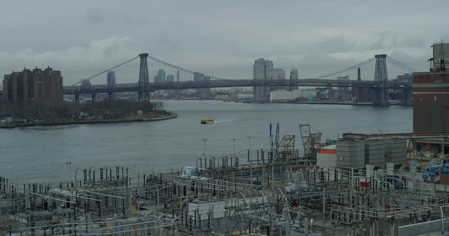 A large bridge leads to the city